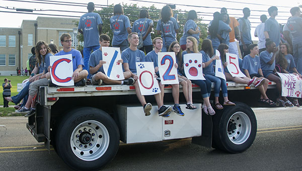 DAILY LEADER / KATIE WILLIAMSON / Brookhaven High School seniors ride to the first day of school on the flatbed of an 18-wheeler early Thursday morning.