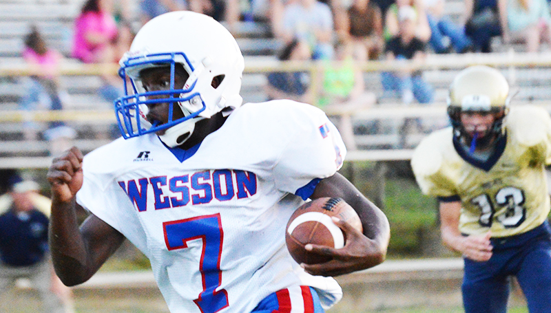Wesson sophomore Jermaine James (7) speeds up the field Friday. He led his team in rushing and had one fumble recovery during the jamboree.