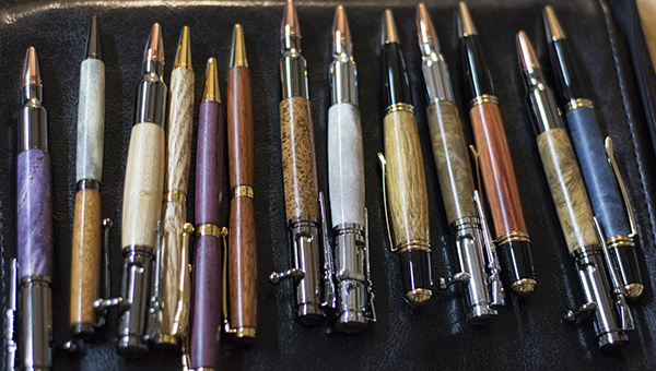DAILY LEADER / KATIE WILLIAMSON / Rushing has crafted pens from a variety of materials, purple-heart wood to antler.