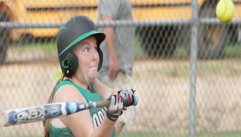 DAILY LEADER / MARTY ALBRIGHT / West Lincoln's Anna Brooke Davis hits a single up the middle Thursday afternoon against the Pisgah Lady Dragons.