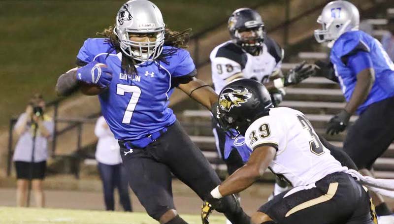 CO_LIN MEDIA / JOHNNY SMITH / Co-Lin running back DeLance Turner (7) dodges East Central linebacker Thomas McCool (39) in Thursday's JUCO action at Stone Stadium.