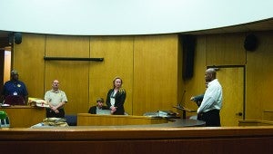 Photo by NATHANIEL WEATHERSBY A jury found Aaron Lyons guilty of manslaughter and armed robbery Thursday. Lyons (at right) elected not to testify during the trial.