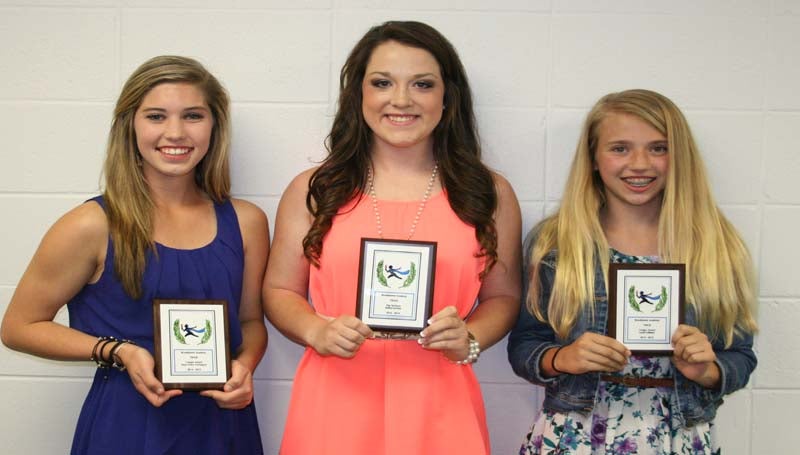 DAILY LEADER / MARTY ALBRIGHT / The Brookhaven Academy girls track team was honored during the school's athletic banquet. Players receiving awards were (from left) Anna Grace Covington, Cougar Award; KK Jordan, Top Sprinter; and Lucy Leblanc, Cougar Award.