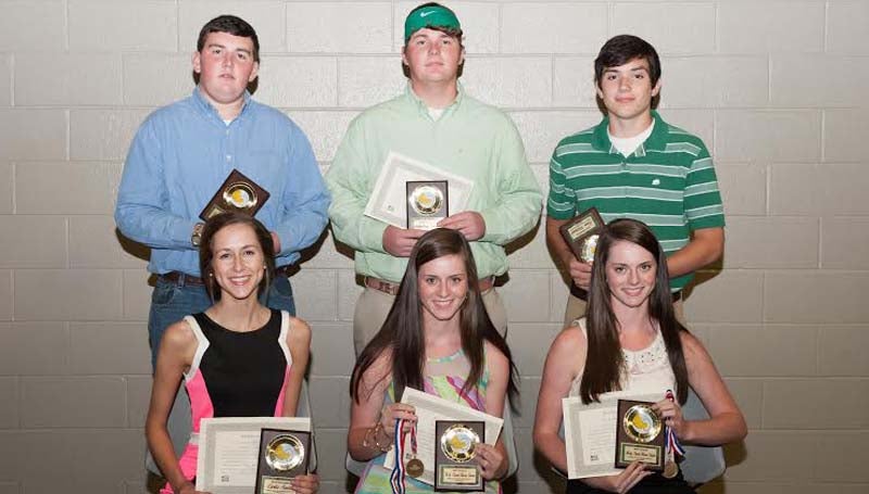 DAILY LEADER / THERESA ALLRED / The West Lincoln Tennis team was honored during a spring athletic banquet. Players receiving awards were (seated, from left) Carly Smith, Sportsmanship Girl Award; Kara Clark, Most Valuable Doubles, Back-To-Back State Champs; Katy Clark, Most Valuable Doubles, Back-To-Back State Champs; (standing) Timothy Stogner, Sportsmanship Boy Award; Sebastian Harrell, Most Valuable Singles; and Liam Rutland, Most Improved Boy.