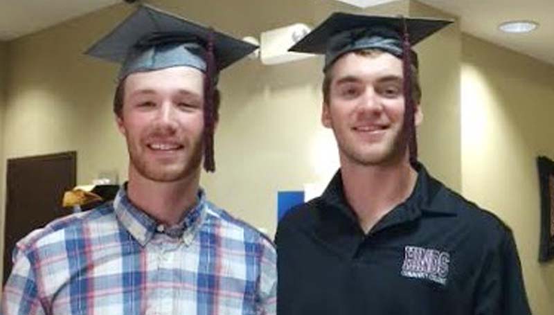 DAILY LEADER / Photo submitted / Brookhaven natives Andrew Culver (right) and Houston Case pose together after graduating from Hinds Community College.