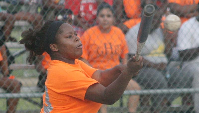 DAILY LEADER / MARTY ALBRIGHT / Shamirra Walker collects a hit for the Lilly Hill Stickz softball team at Dr. A.L. Lott Field.