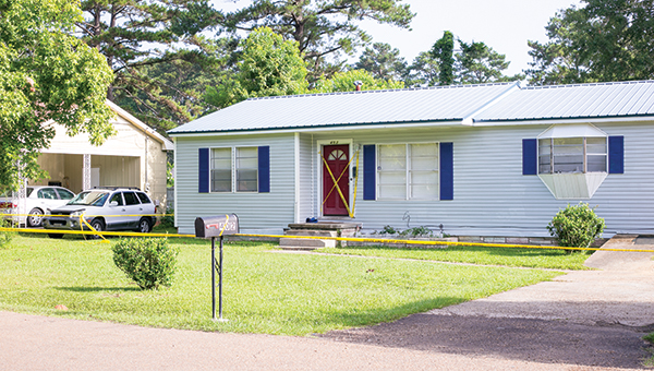 Photo by Kaitlin Mullins Crime scene tape can be seen on Vivian Merritt where a fatal shooting into a house was reported late Monday night. The shooting was one of two reported in two days. The first took place at Cloverdale No. 73.