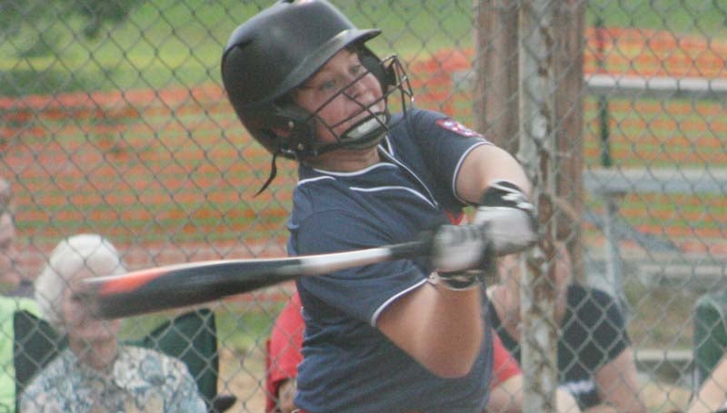 DAILY LEADER / MARTY ALBRIGHT /  Lincoln County Nationals' Cooper Moak smashes a huge grand slam home run in the sixth inning against Walthall County in Dixie Youth 11-and-12-year-old District Six Tournament action at Leroy "Cowboy" Jones Memorial Field.