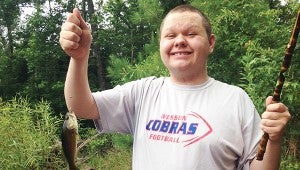 Photo submitted Matt Wages, 19, shows off his catch. Wages graduated in May from Wesson Attendance Center despite his limited-functioning autism.