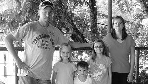 Photo submitted Justin and Kim Rippy are pictured with their three children, (from left) Julie, Jack and Jessie in this file photo.