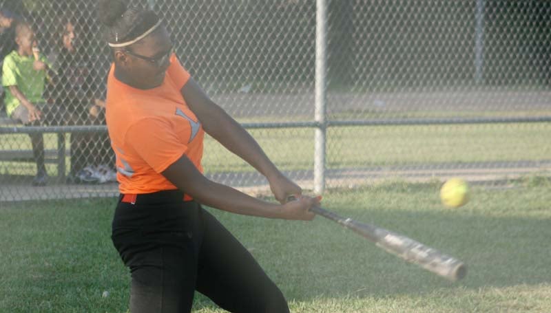 DAILY LEADER / T'Keyah Catchings collects a big hit for Lilly Hill Stickz.