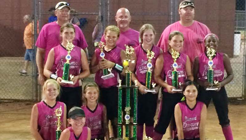 DAILY LEADER / Photo Submitted / The Diamond Drama 04 softball team out of Summit won first place in the USFA Class A State Tournament in Brandon on June 27. Members of the team are (from left, kneeling) Sydney Williams of Summit; Bailee Goodson of Brookhaven; Mary Claire Johnson of Brookhaven; Emma Rankin (laying down) of Taylorsville; Brooke Cade of Brookhaven; (middle row) Averi Paden of Summit; Katelynn Ward of Monticello; Emily Claire Felder of Summit; Abbigail Waters of Magee; Destiny Crosby of Raleigh; (back row) Coach Richard Williams, Coach Jeff Paden and Coach Robby Goodson.