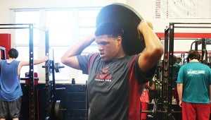 Wanya Morris does some strength condition exercises  during Brookhaven’s summer workout.