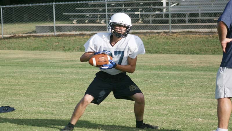 DAILY LEADER / MARTY ALBRIGHT / Bogue Chitto's Cody Halford works on his receiving skills during practice Thursday.
