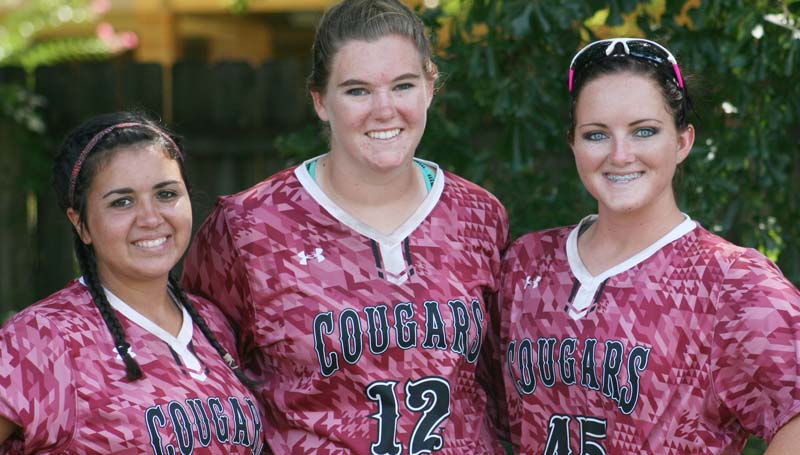 DAILY LEADER / Marty Albright / Lawrence County softball seniors (from left) Barri Rogers, Jordan Harp and Emalee Gaffney are excited to get the 2015 slowpitch season to get under way. LCHS Lady Cougars will be in action Aug. 15 at Puckett.