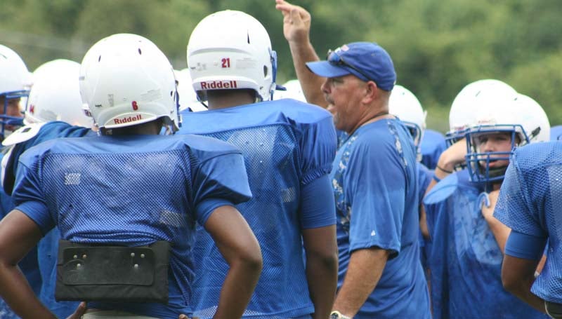 DAILY LEADER / MARTY ALBRIGHT / Wesson head coach Ronald Greer gives his players some instruction at practice Monday. The Cobras will kick off their season Aug. 21 hosting the McLaurin Tigers at Stone Stadium on Co-Lin Campus.