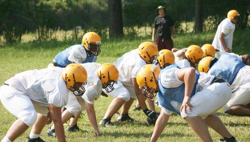 DAILY LEADER / MARTY ALBRIGHT / Enterprise football players line up to work on some plays during practice.