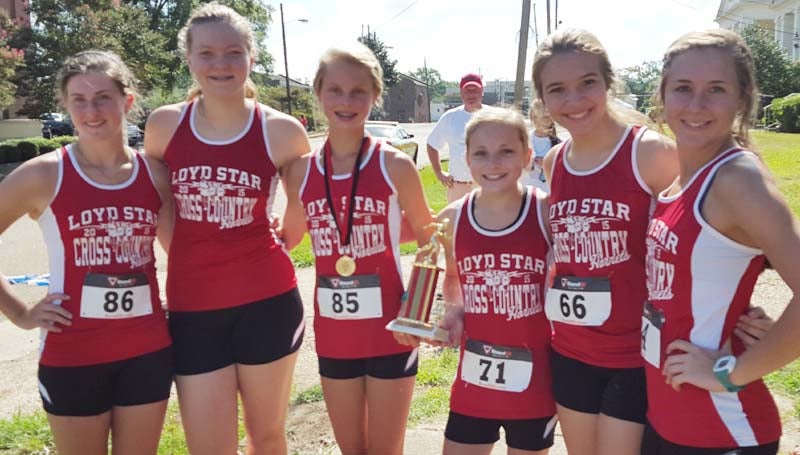 DAILY LEADER / Photo submitted / LADY HORNETS RUN - Loyd Star's varsity girls placed third overall in Saturday's meet at the Loyd Star Cross Country Invitational Meet. Abby Thomas finished first place overall in the girls race.
