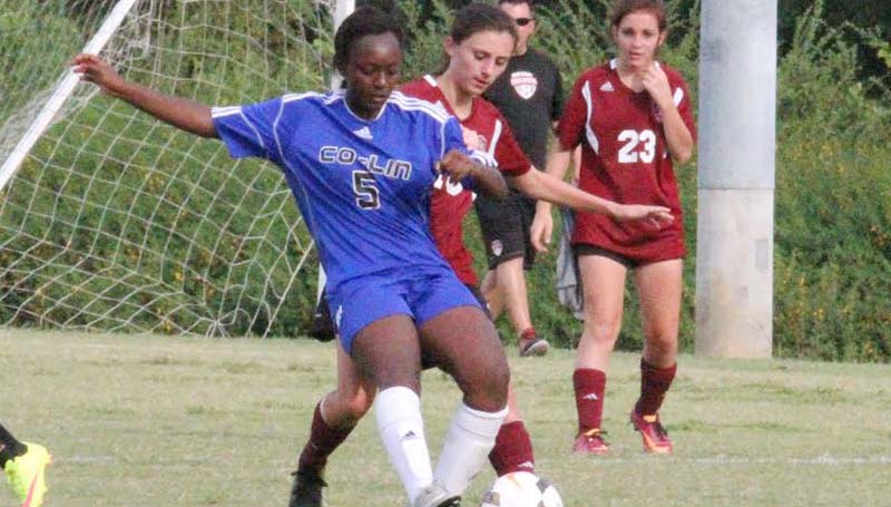 Co-Lin Media / Natalie Davis / Copiah-Lincoln forward S' Middleton, seen here battling for possession, scored the lone goal for the Lady Wolves in a 5-1 loss to Holmes.