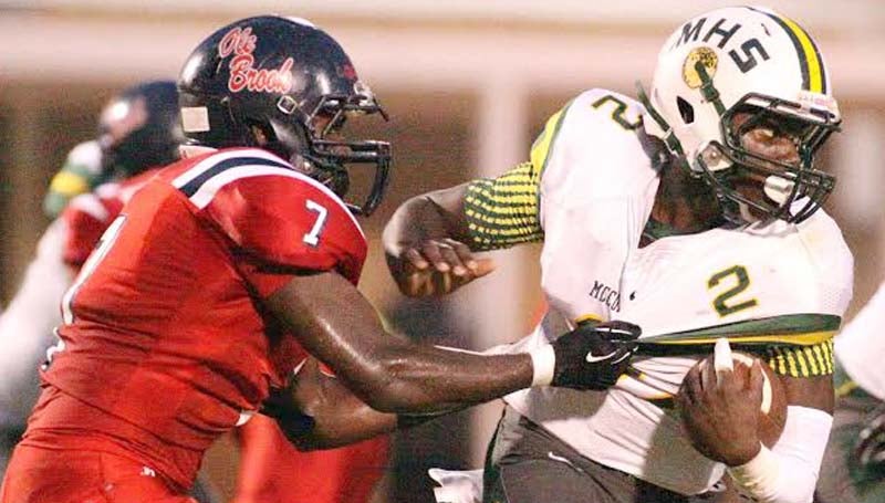 DAILY LEADER / Jonathon Alford / Brookhaven defender Wesley Calcote (7) prepares to bring down McComb's quarterback Venchenza McCray (2) in the backfield.