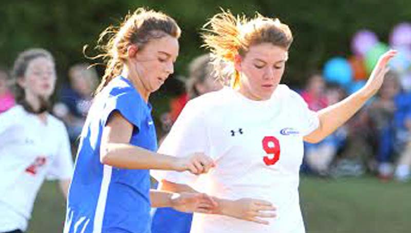 Daily Leader / Sherylyn Evans / Brookhaven Academy's Shelby Flumm (left) battles for possession against Copiah Academy Monday.