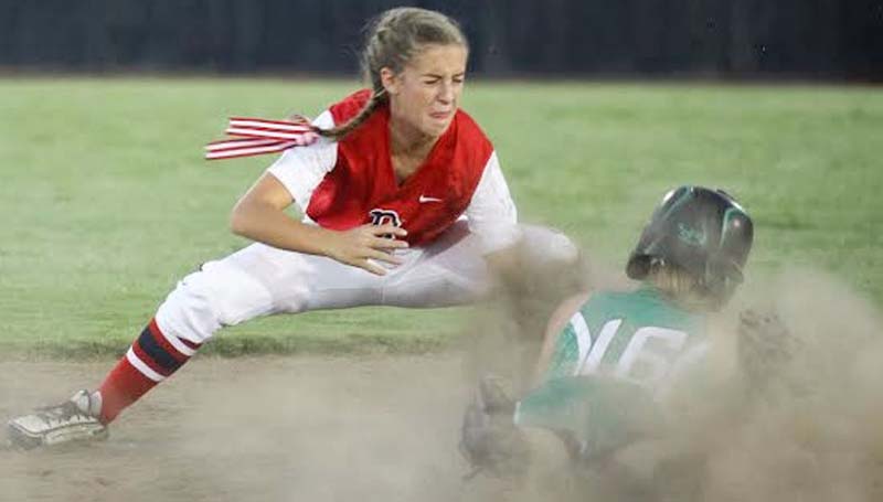 Daily Leader / April Clopton / Brookhaven second baseman Kat Wallace records the out at second base as West Lincoln's runner Peyton White (16) slides in Tuesday night.