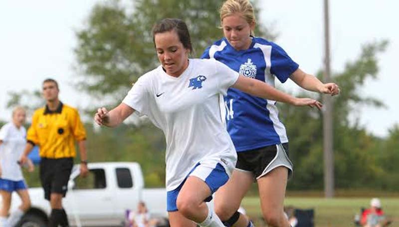 Daily Leader / Sherylyn Evans / Brookhaven Academy's Shelby Flumm (left) battles for possession against ACCS.