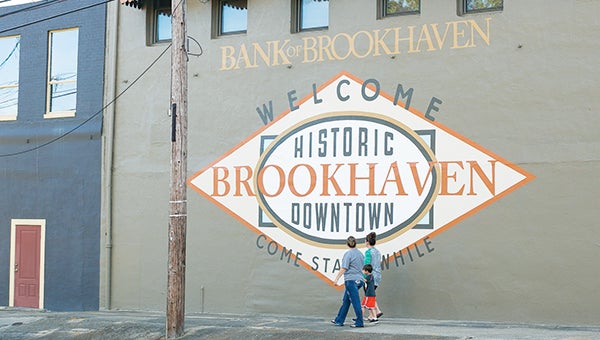 Photo by Kaitlin Mullins  Bank of Brookhaven sponsored a sign to be painted downtown to bring attention to the historic area.