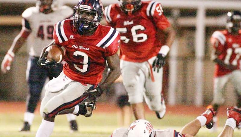 Daily Leader / Jonathon Alford / Brookhaven's Thomas Poole (3) eludes a South Jones defender for a big gain Friday night at King Field.