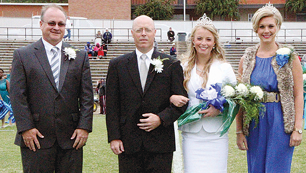 Greta Carley of Columbia (second from right) was crowned Copiah-Lincoln Community College’s 2015 homecoming queen during ceremonies prior to the football game on Saturday. Greta is the daughter of Trey (second from left) and Amy Carley of Columbia. Making the presentation were Co-Lin President Ronnie Nettles (far left) and 2014 homecoming queen Caroleah Brister of Bogue Chitto.