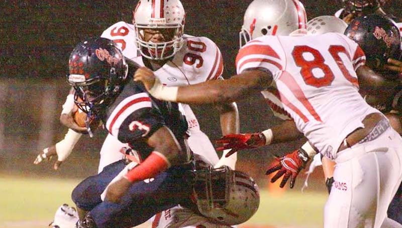 Daily Leader / Jonathon Alford / Brookhaven's senior running back Thomas Poole fights through several Provine defenders to help his Panthers collect their first win Friday night at King Field.