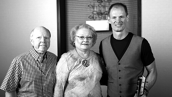 Photo submitted / Terry and Jane Leary (from left) of Smith Jewelry in Brookhaven attended a semi-annual conference in Nashville where they met the keynote speaker (right) Mike Rayburn.