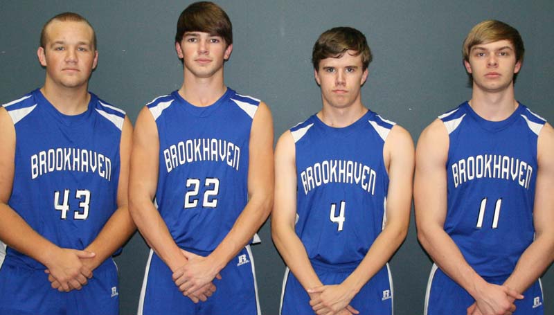 Daily Leader / Marty Albright / Seniors playing basketball for the Brookhaven Academy Cougars are (from left) Roger Rushing, Ross Felder, Hunter Griffin and Austin Smith.