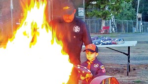 Photo submitted Jack Rippy, pictured here with Hog Chain Volunteer Fire Department Chief John Hart, retired a flag in honor of his late father on Saturday at Exchange Club Park as a part of a flag retiring event. Many organizations were represented and participated by burning flags including: Boy Scouts of America Troop 450 and Pack 450, the Brookhaven Police Department, Lincoln County Sheriff’s Office, Exchange Club, Modern Woodmen of America, local VFDs and the Brookhaven Fire Department as well as a host of veterans.