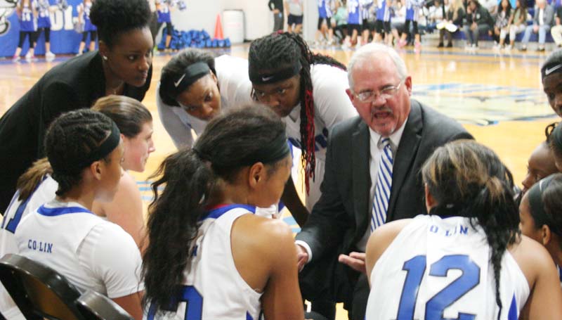 DAily Leader / Marty Albright / Co-Lin women's coach Gwyn Young talks to his players during a timeout in the fourth quarter against Holmes in JUCO basketball action Monday night at Mullins Gymnasium.