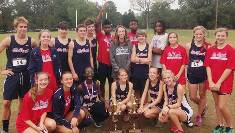 Daily Leader / photo submitted / The Brookhaven Panthers and Lady Panthers capture first place in both the boys and girls cross country regional meet in Clinton.