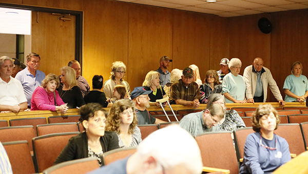 Photo by Kaitlin Mullins A crowd anxiously waits for election results Tuesday night at the Brookhaven-Lincoln County Government Complex. Citizens were glued to a monitor displaying numbers as they were entered from each ballot box, and many appreciated the swift information.