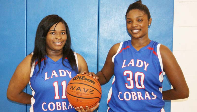 Daily Leader / Marty Albright / Wesson Lady Cobras seniors (from left) Carnesha Green and Jashia Smith.