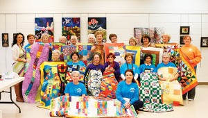 Photo by Kaitlin Mullins The Brookhaven Piecemaker’s Quilt Guild presented The Berean Children’s Home with 25 handmade quilts on Monday as a donation one year in the making.