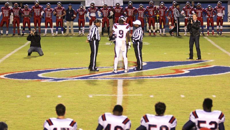 Daily Leader / April Clopton / Prior to the opening kick, Pascagoula held a special ceremony to honor former graduate Keith Joseph Jr. who died in an accident last week. Brookhaven's Darrian Wilson (9) and Pascagoula's Jonathan Boulton (9) met at midfield wearing Joseph's No. 9 Friday night.