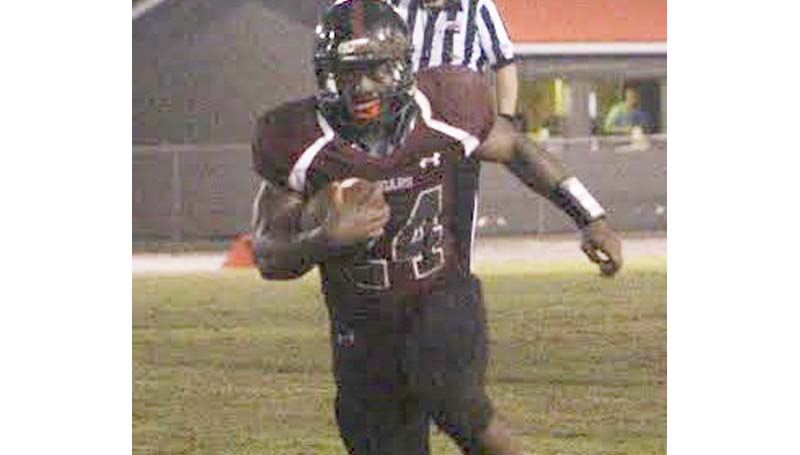 Daily Leader / Photo Submitted / Lawrence County's Quitten Brown (24) scores the winning touchdown in double overtime to give his Cougars a 26-20 win over East Central Friday night in Monticello.