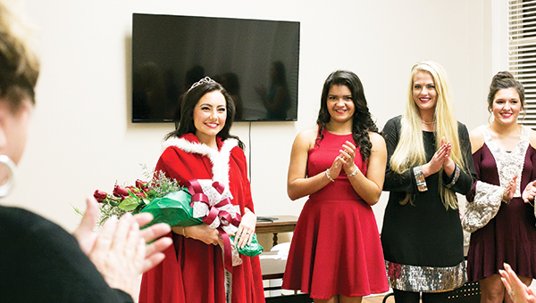 Photo by Kaitlin Mullins Morgan Wallis, 17, was crowned Miss Merry Christmas Monday evening at the Brookhaven-Lincoln County Chamber of Commerce. Miss Merry Christmas participates in various activities such as the Christmas parade Dec. 3 and Christmas open houses. Miss Merry Christmas is judged on personality, poise and appearance, modeling Sunday attire and an interview. Wallis, of Bogue Chitto, is the daughter of David and Brittany Teaster and the late Shane Wallis.