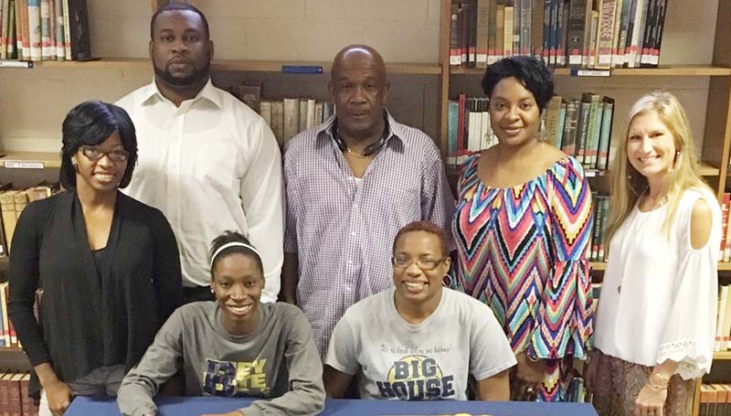 Daily Leader / Photo Submitted / Bogue Chitto Lady Cats senior guard Zariah Matthews has signed a basketball scholarship with the Mississippi College Lady Choctaws. Present for the ceremony was her mom (seated) Fredricka Perkins; (standing, from left) Tarika P. Matthews (aunt), Fred Perkins Jr. (uncle), Mark Nobles, Lorenda Reese (aunt) and Bogue Chitto girls basketball coach Christi Terrell.
