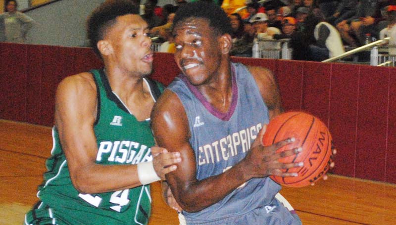 Daily Leader / Marty Albright / Enterprise's Jontavious Smith (35) drives in for a layup against Pisgah's Chris Jones (24) Friday night.