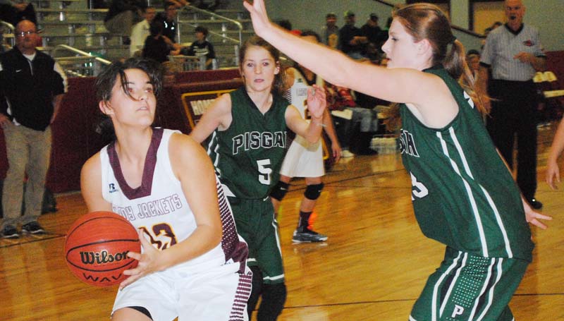 Daily Leader / Marty Albright / Enterprise's Michelle Herrington (13) works the ball in the low post for a good shot in girls action against Pisgah Friday night.