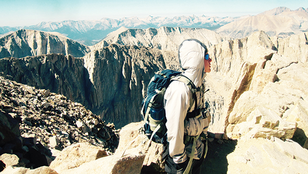 Photo submitted / Above, Haddon Smith climbs to the top of Mt. Whitney in California for his 13-year-old challenge. Miranda and Kirk Smith (pictured below) like to take what some might call an “outside of the box” approach to parenting. Their coming-of-age challenge is a unique idea the Smiths cherish for their children.