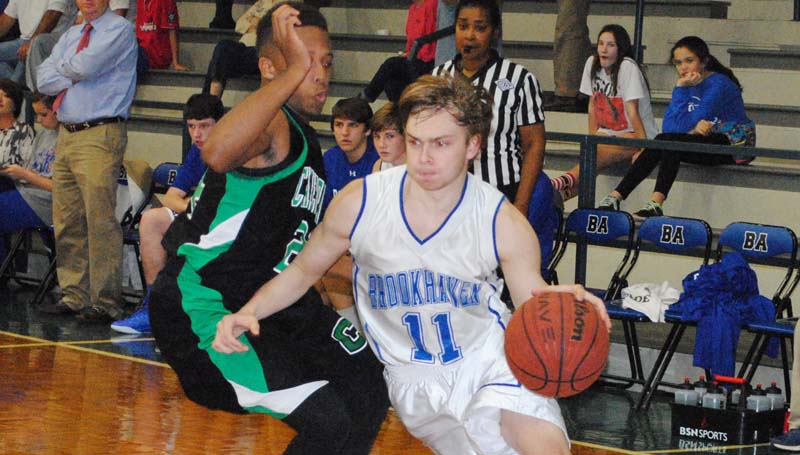 Daily Leader / Marty Albright / Brookhaven Academy's Austin Smith (11) drives to the basket in boys action against Natchez Cathedral.