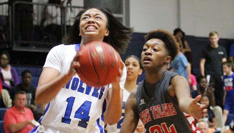 Co-Lin Media / Natalie Davis / Co-Lin's Tytiana Hall drives by Mississippi Delta's TaKayla Dukes in Monday night action at Mullins Gymnasium.