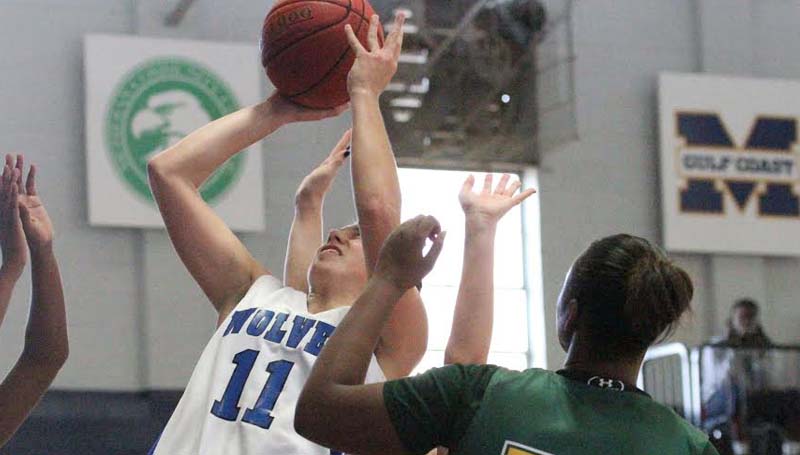Co-Lin Media / Natalie Davis / Co-Lin's Kelley Allen (11) grabs one of her game-high 12 rebounds against Delgado Saturday afternoon.