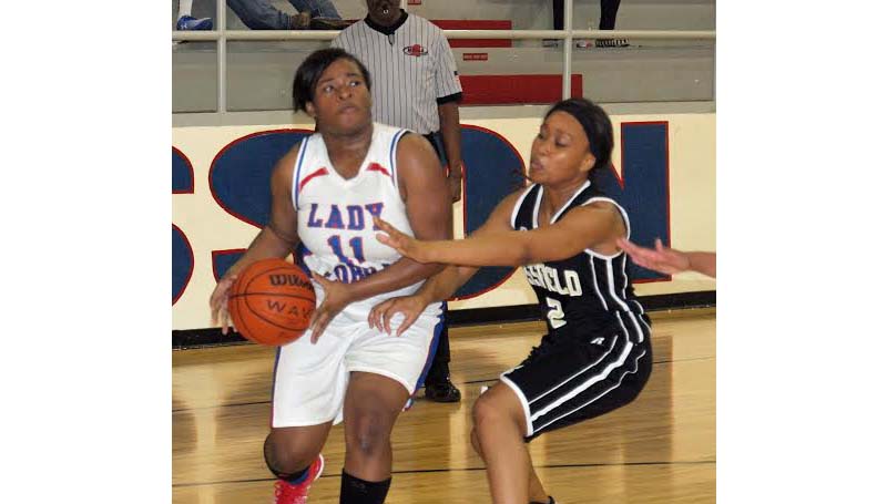 Daily Leader / Tracy Fischer / Wesson's Carnesha Green (11) looks to take a shot Friday night against Bassfield's Ah'Lexus Johnson (2).